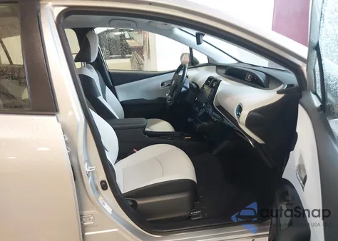 2021 Toyota Prius Xle z USA, uszkodzony, nr VIN JTDKAMFU4M3147210